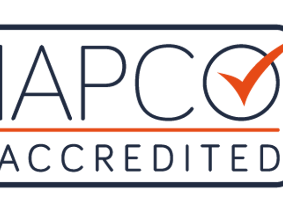 An image of the IAPCO Approved logo shows a navy rounded rectangle with the text IAPCO accredited stacked vertically. A large orange tick is inside the O and an orange line separates the words.