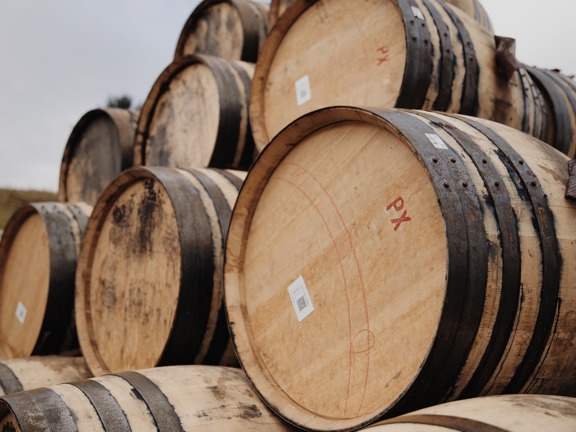 Wooden whisky barrels piled on top of each other